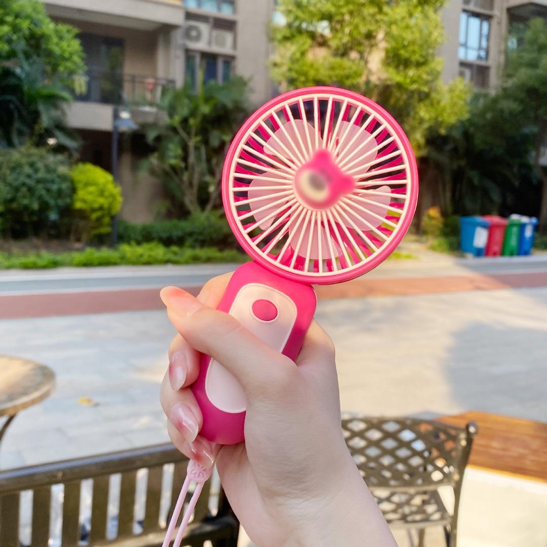 QUALITY RECHARGEABLE HANDY MINI FAN WITH ELASTIC HOLDER..